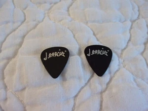 LOTE DE 2 PÚAS DE GUITARRA JERRY GARCIA GRATIFY DEAD DEAD EN NEGRO Y PLATA - Imagen 1 de 2