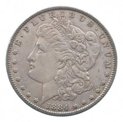 Principios - Dólar de plata Morgan 1884 - 90% moneda de Estados Unidos *243 Foto 1 de 3