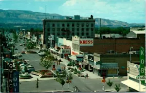 1960s CO Postcard Grand Junction Downtown Shops Main Street Old Cars Signs Kress - Picture 1 of 2