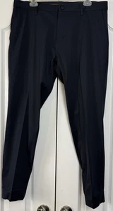 Rhone Herrenhose 35 x 30 schwarz Pendlerhose Stretch Reißverschluss Knöchelleistung gebraucht, in einwandfreiem Zustand - Bild 1 von 12