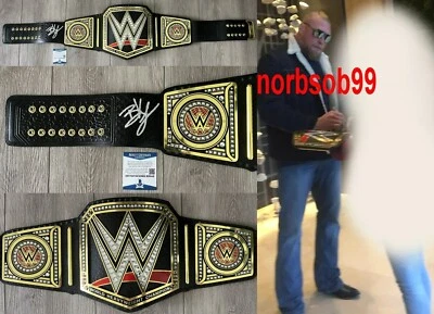 CINTURÓN DE CUERO FIRMADO POR ROCK LESNAR CAMPEONATO WWE con PRUEBA EXACTA CERTIFICADO DE AUTENTICIDAD BECKETT BAS Foto 1 de 4