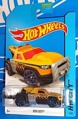 Hot Wheels 2014 HW City Works Series #1 Repo Duty amarillo y negro con TRAP5s Foto 1 de 2