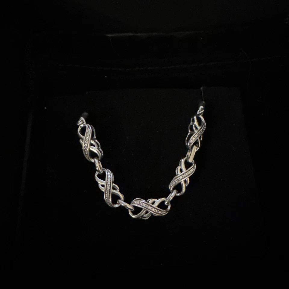 PULSERA BOLO DE PLATA ESTERLINA DOBLE INFINITO CON ACENTO DE DIAMANTES ZALE'S JEWELERS Foto 1 de 4
