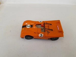 Carrera Universal: coche de carreras Porsche naranja, número 2, función no comprobada - Imagen 1 de 5