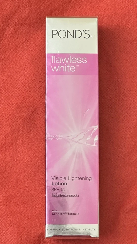 Loción aclaradora visible blanca impecable Pond's FPS 15 Foto 1 de 4