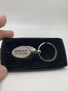 Llavero promocional vintage de metal GMAC en plata - Imagen 1 de 7