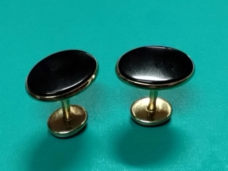 Gemelos de oro amarillo de 14 quilates Dolan Bullock "D:B" ovalados de ónix negro joyería para hombre  Foto 1 de 4