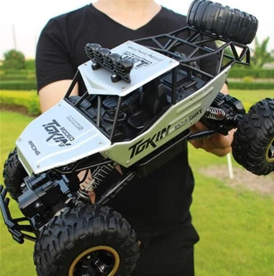 Coches de radiocontrol 4x4 versión actualizada 2.4G radio control coches de radiocontrol juguetes buggy alta velocidad Tru Foto 1 de 2