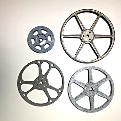 Lote de carretes de película vintage (4) - Metal 6" y 5", plástico 3" - Revere, Brumberger, Kodak Foto 1 de 4