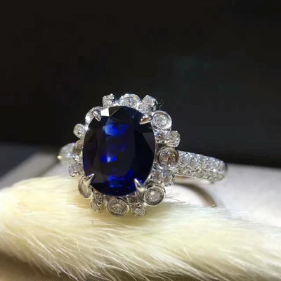 Anillo de compromiso con halo de zafiro creado en laboratorio de 2 quilates acabado sólido de oro blanco de 18 quilates Foto 1 de 4