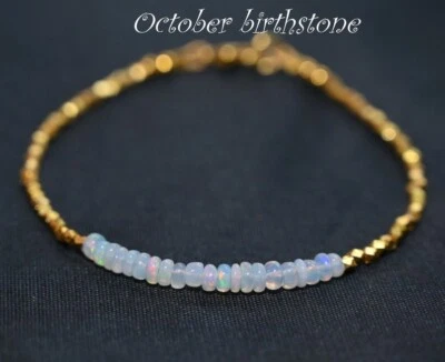 Pulseras A+ de cuentas de piedras preciosas multifacéticas de ópalo etíope y pirita dorada de 6-8"" Foto 1 de 4