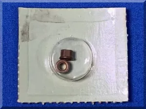 VINTAGE ATLAS SLOT CAR HOME RACING PARTS - REPLACEMENT CHASSIS 1/8 AXLE BEARING - Picture 1 of 2
