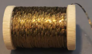 OLD GOLD EMOSSED TINSEL ON WOODEN SPOOLS - Picture 1 of 5