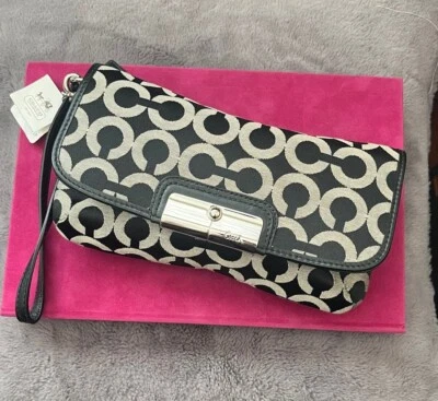 Bolso Muñequera COACH (NUEVO) SV/Negro Blanco/Negro, Etiqueta Nombre: KRI OP ART LG WRL Foto 1 de 4
