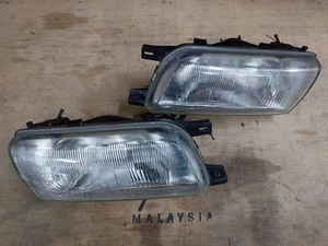 Nissan AD Wingroad California AD Resort Y10 Headlights Zenki - Picture 1 of 12