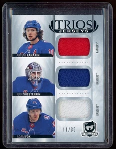 2021-22 The Cup Cup Trios Jerseys Artemi Panarin/Adam Fox/Igor Shesterkin 11/35 - Bild 1 von 2