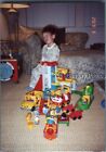 FOUND COLOR PHOTO J+0382 BOY SITTING BY TOYS