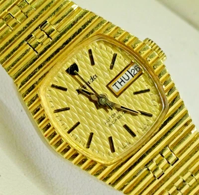 VINTAGE NOS NIVADA AUTOMATIC DAY-DATE WATCH LADIES GOLD PLATED - Image 1 of 4