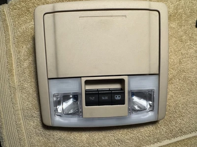 Lincoln MKS 2014 OEM luz de cúpula interior, interruptor de techo corredizo, soporte para gafas bronceado Foto 1 de 4