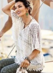 CAbi Häkelspitze Poncho Oberteil Damen Größe XS beige Fransen Dolman V-Ausschnitt Strick  - Bild 1 von 8