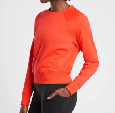 Sudadera para mujer Athleta mediana atardecer fruncida cuello redondo naranja pulóver usada en excelente estado Foto 1 de 4