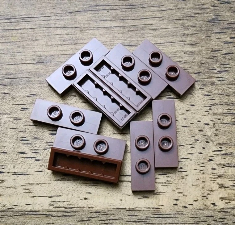 LEGO Reddish Brown Plate, Modified 1 x 3, 2 Studs Double Jumper QTY 10 34103 - Image 1 of 1