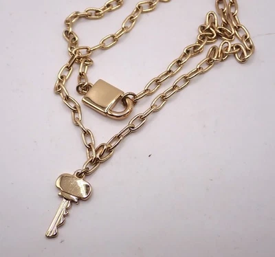 J. Collar con cerradura y llave tono dorado CREW, dos hilos 22" Foto 1 de 4