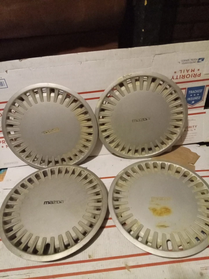 Used OEM Set 14" Hub Caps Wheel Covers GJ2937170 1988-92 Mazda 626 MX-6 (3369) - Image 1 of 4