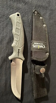 Cuchillo Camillus hoja fija mango de goma Foto 1 de 2