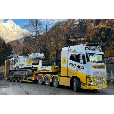 WSI 01-4753 VOLVO FH4 Trattore 6X4 + Semi-Sottoposto Rampe "MEDIACO" MINT - Immagine 1 di 4