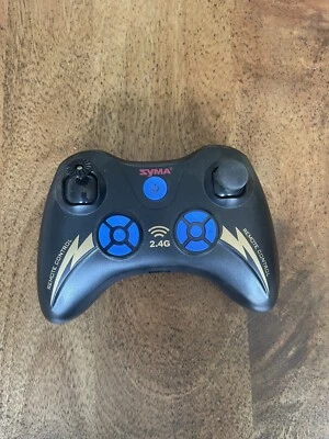 Transmisor de control remoto Syma de 2,4 GHz para drones y helicópteros RC Foto 1 de 2