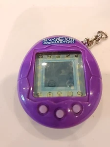 2004 Tamagotchi Connection Plus V1 Bandai Solid Purple FUNZIONANTE con batteria nuova - Foto 1 di 4