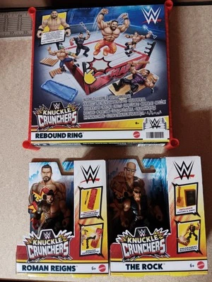 ¡NUEVO! Anillo de rebote WWE Knuckle Crunchers con Seth Rollins, The Rock & Roman Reigns Foto 1 de 4