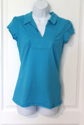 Camiseta túnica Union Bay talla L para mujer Jr verano manga corta cuello en V azul liso Foto 1 de 4