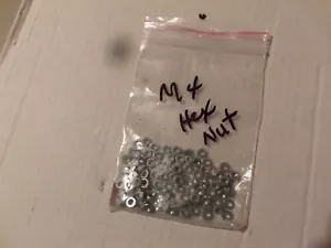 LOT OF 25 Pcs.....METRIC M4 HEX NUTS....PLATED - Picture 1 of 2