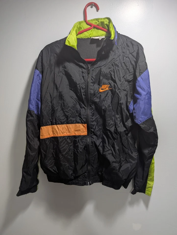 Chaqueta cortavientos de colección Nike juvenil 100 % nailon cremallera completa negra/púrpura/naranja • XL  Foto 1 de 3