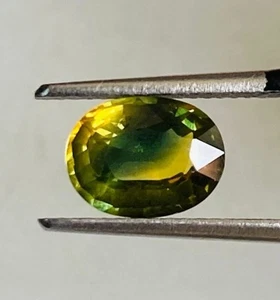 2,10 CTS ZAFFIRO PARTI AUSTRALIANO, TAGLIO OVALE 9 X 6,7 MM, BLU/VERDE/GIALLO - Foto 1 di 9