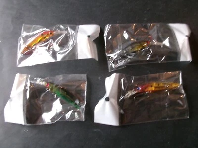 4 leurres de pêche a la truite neufs. avec bruiteur. - Photo 1/4