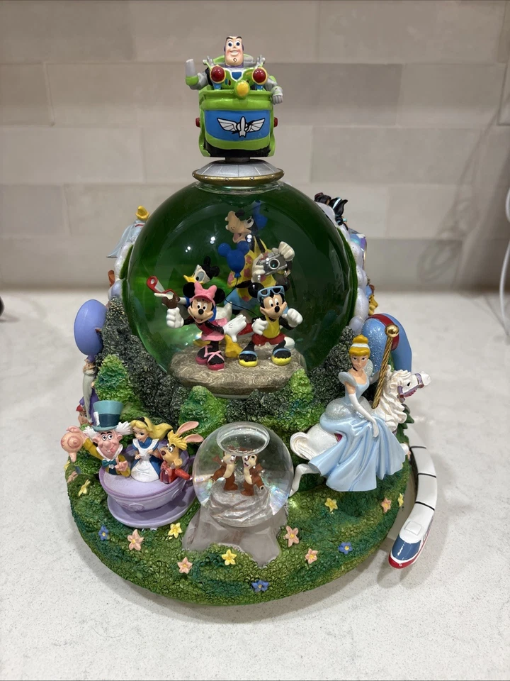 MONORRAÍL MUSICAL GLOBO DE NIEVE DISNEY FOUR PARKS ONE WORLD LEER Foto 1 de 4