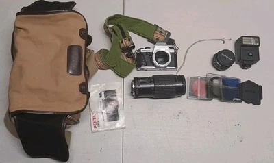 PENTAX Super Program 35mm Film Camera SMC Pentax-A 50mm f/2.0 lens And More  - Image 1 of 4