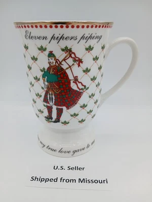 Taza con patas American Atelier 12 días de Navidad once pipers piping 11th Foto 1 de 4