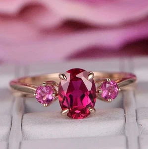2Ct Oval Lab-Created Ruby Three Stone Women's Wedding Ring 14K Rose Gold Plated - Picture 1 of 5