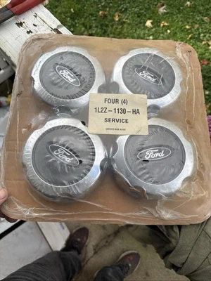 NEW FoRD OEM Set Of 4 OF WHEEL CENTER CAPS PART # 1L2Z-1130-HA - Image 1 of 2