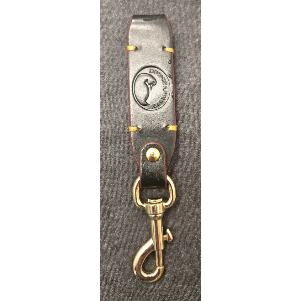 Llavero Dooney & Bourke de cuero negro logotipo de pato tono dorado clip llavero Foto 1 de 4