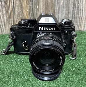 Nikon EM Film Camera with JCPenney Multi-Coated Optics 1:2.8F=28MM 55MM Lens - Picture 1 of 10