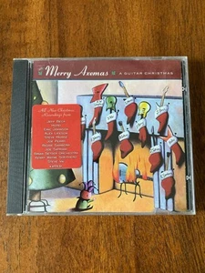 Merry Axemas A Guitar Christmas CD Satriani Jeff Beck Steve Vai Sambora Setzer - Picture 1 of 3