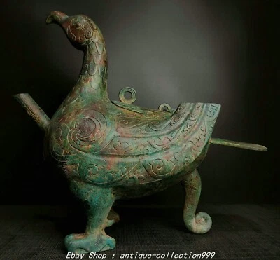 Tetera de vino animal pájaro fénix mercancía de bronce dinastía Shang Zhou de 15,7" Foto 1 de 4