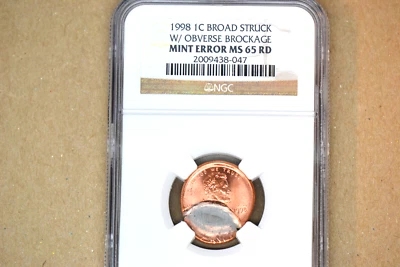 1998 Lincoln Cent- Broadstruck w/ Obverse Brockage- NGC MS-65 RD.    Dramatic!! - Image 1 of 4