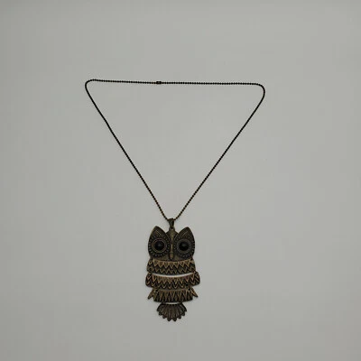 Colgante de búho de metal articulado con ojos de cabujón negro Foto 1 de 4
