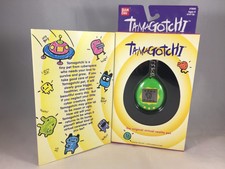 New Bandai Original TamaGotchi Green & Yellow, 1996 - 1997 English